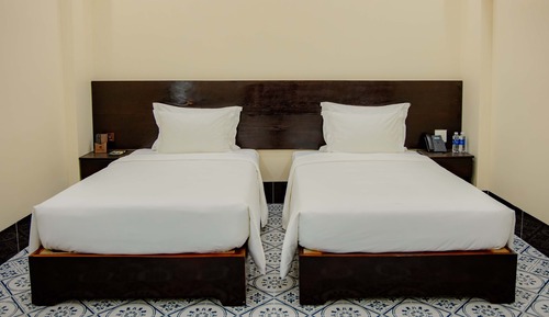 Habitación con 2 camas individuales