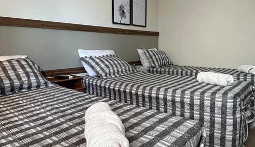 Habitación triple Deluxe