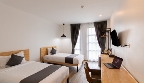 Habitación básica con 2 camas individuales