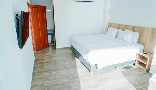 Habitación superior con 1 cama doble o 2 individuales, vistas al mar
