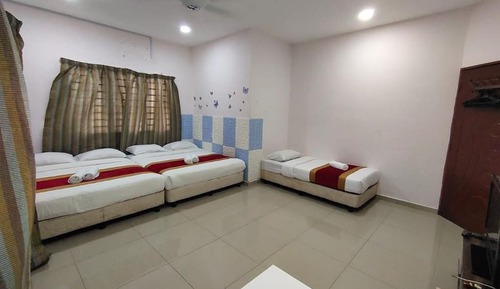 Habitación familiar, varias camas