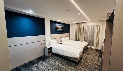 Habitación triple Deluxe, baño privado
