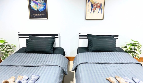 Habitación con 2 camas individuales