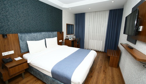 Habitación estándar con 1 cama doble o 2 individuales