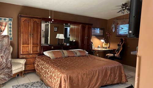 Suite estudio Signature, 1 cama de matrimonio grande, balcón, en la zona del patio