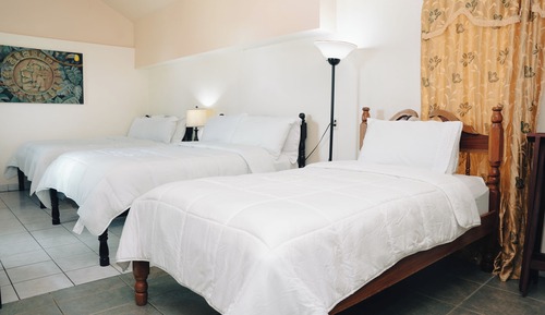 Habitación triple Deluxe, varias camas