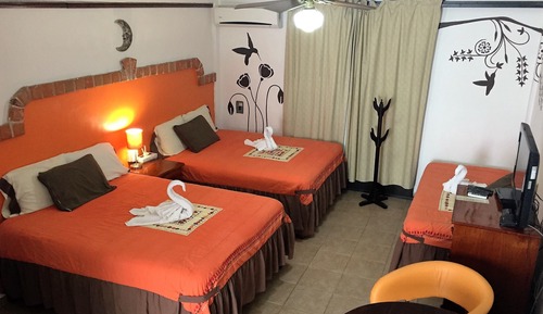 Suite estudio Confort, varias camas, cocina, en una planta alta