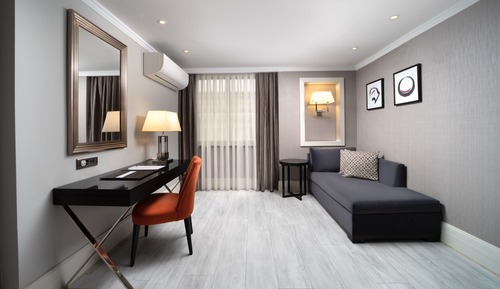 Habitación Deluxe con 2 camas individuales, varias camas, vistas a la ciudad