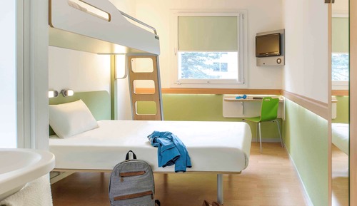 Habitación triple, varias camas