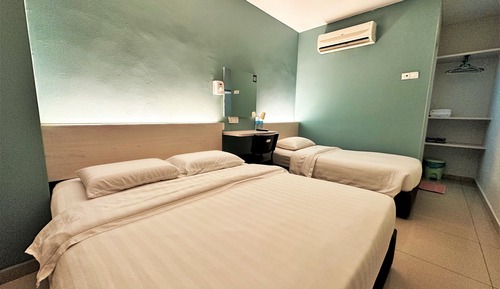 Habitación triple superior, varias camas