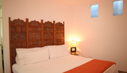 Habitación superior, vistas al jardín (Huayacán)