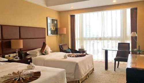 Habitación Deluxe, varias camas