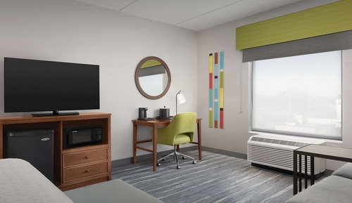 Habitación, 1 cama de matrimonio grande con sofá cama, frigorífico y microondas