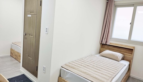 Habitación con 2 camas individuales