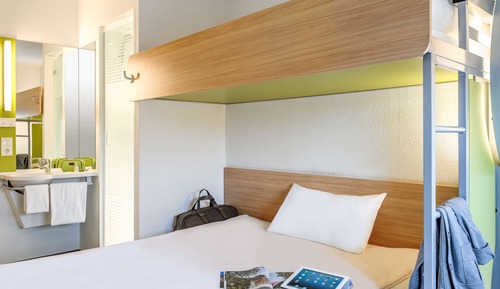Habitación triple, varias camas