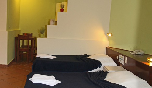 Habitación triple, vistas al jardín