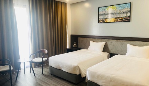 Habitación Deluxe con 1 cama doble o 2 individuales