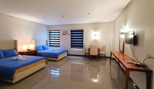 Habitación cuádruple Deluxe