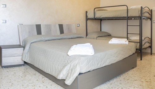 Habitación triple, vistas al mar