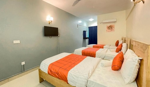 Habitación triple Deluxe