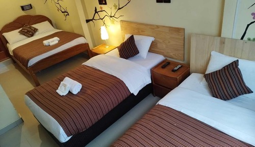 Habitación cuádruple Deluxe