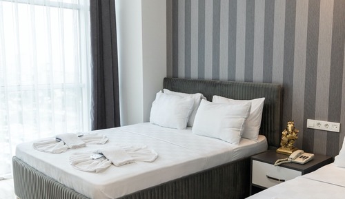 Deluxe Triple Suite