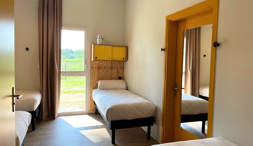 Habitación, varias camas