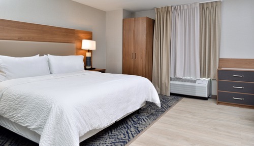 Suite estudio, 1 cama de matrimonio grande, notificación por teléfono o timbre