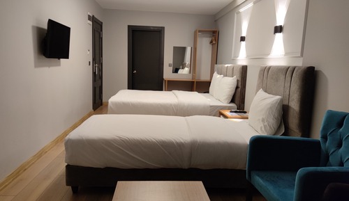 Habitación triple Deluxe, no fumadores, vistas a la ciudad