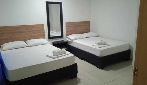 Habitación Deluxe, varias camas