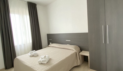 Habitación cuádruple Premium, varias camas