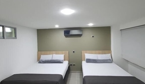 Habitación con 2 camas individuales