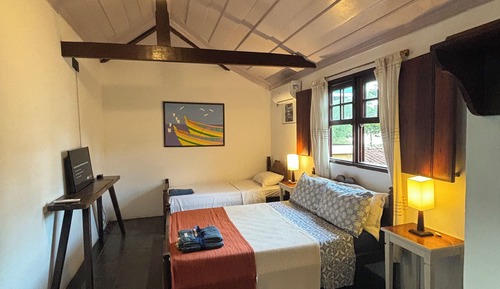 Habitación triple clásica, varias camas
