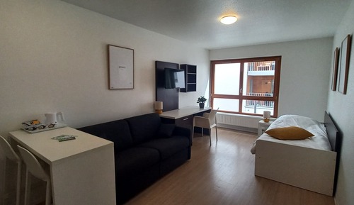 Habitación triple familiar, varias camas