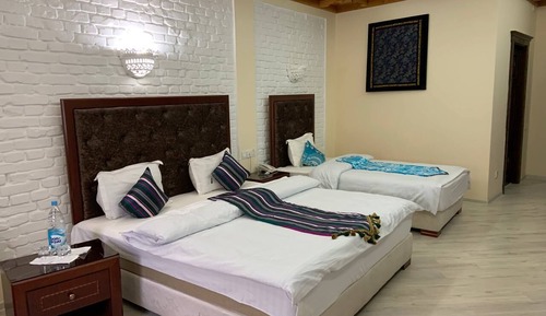 Habitación triple de lujo