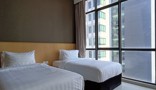 Suite estudio estándar, varias camas, baño privado, vistas a la ciudad
