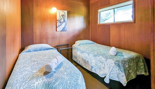Cabaña familiar, 2 habitaciones, no fumadores, en la zona del jardín
