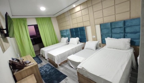 Habitación cuádruple Deluxe