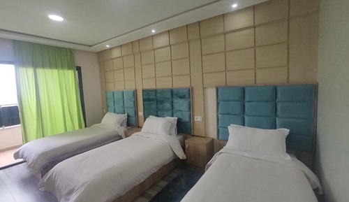 Habitación triple Deluxe