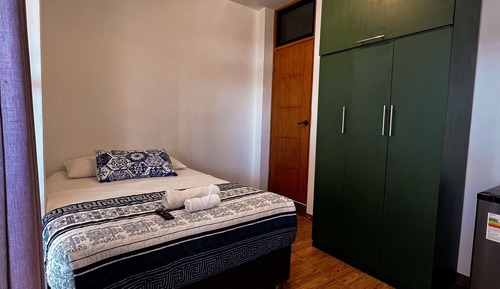 Habitación Deluxe, 1 cama de matrimonio, acceso a la piscina, vistas parciales al mar