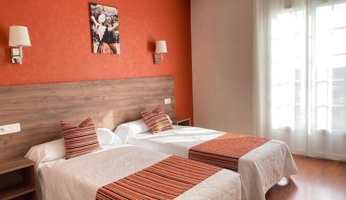 Habitación Confort con 1 cama doble o 2 individuales