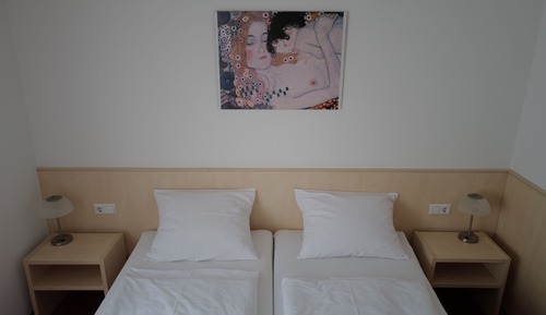 Habitación Confort con 1 cama doble o 2 individuales