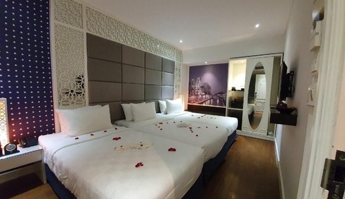 Habitación triple Deluxe