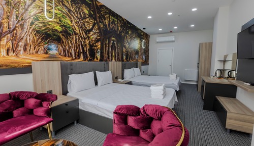 Habitación cuádruple Deluxe, 2 camas de matrimonio