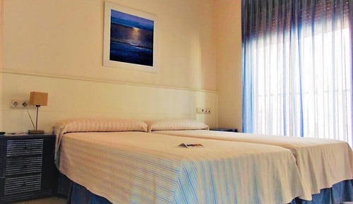 Habitación estándar con 1 cama doble o 2 individuales, patio, planta baja