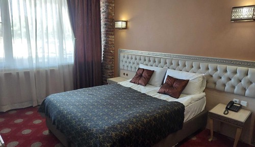 Habitación estándar con 1 cama doble o 2 individuales
