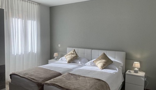 Habitación Confort con 1 cama doble o 2 individuales