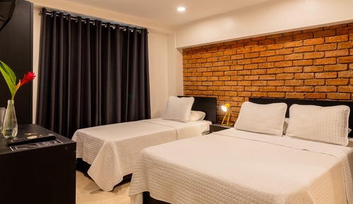 Habitación triple ejecutiva