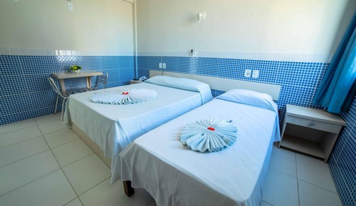 Habitación triple familiar, varias camas