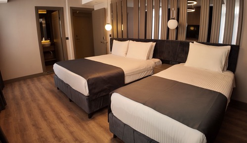 Habitación triple Deluxe